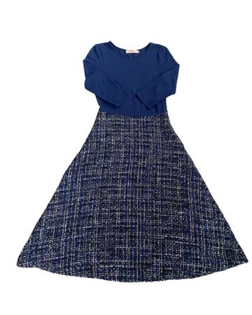 Navy blue dress with a textured skirt on a white background