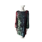 Multicolored sequin dress on a mannequin against a white background