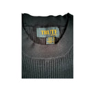 Dark gray sweater with a 'Truth' label on a white background