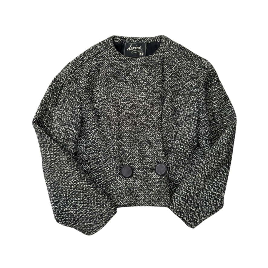 Textured black and gray cardigan with button details on a white background