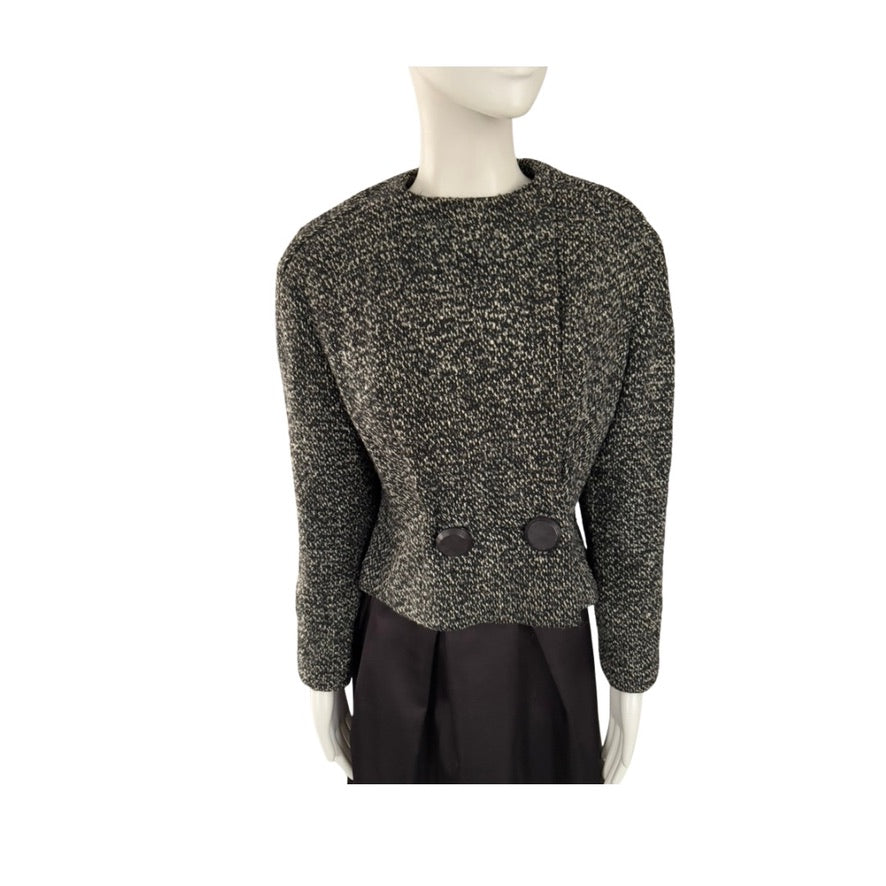 Mannequin wearing a textured gray sweater with two buttons on a white background
