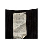 Clothing label with text on a black background