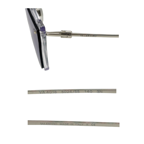 Metallic tool with attachments on a white background