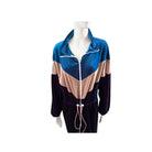 Color-blocked tracksuit on a mannequin against a white background