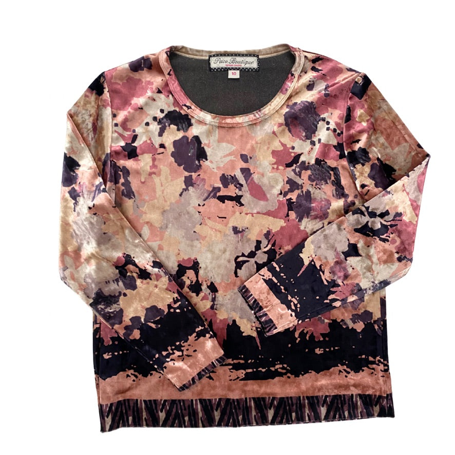 Floral patterned velvet top on a white background