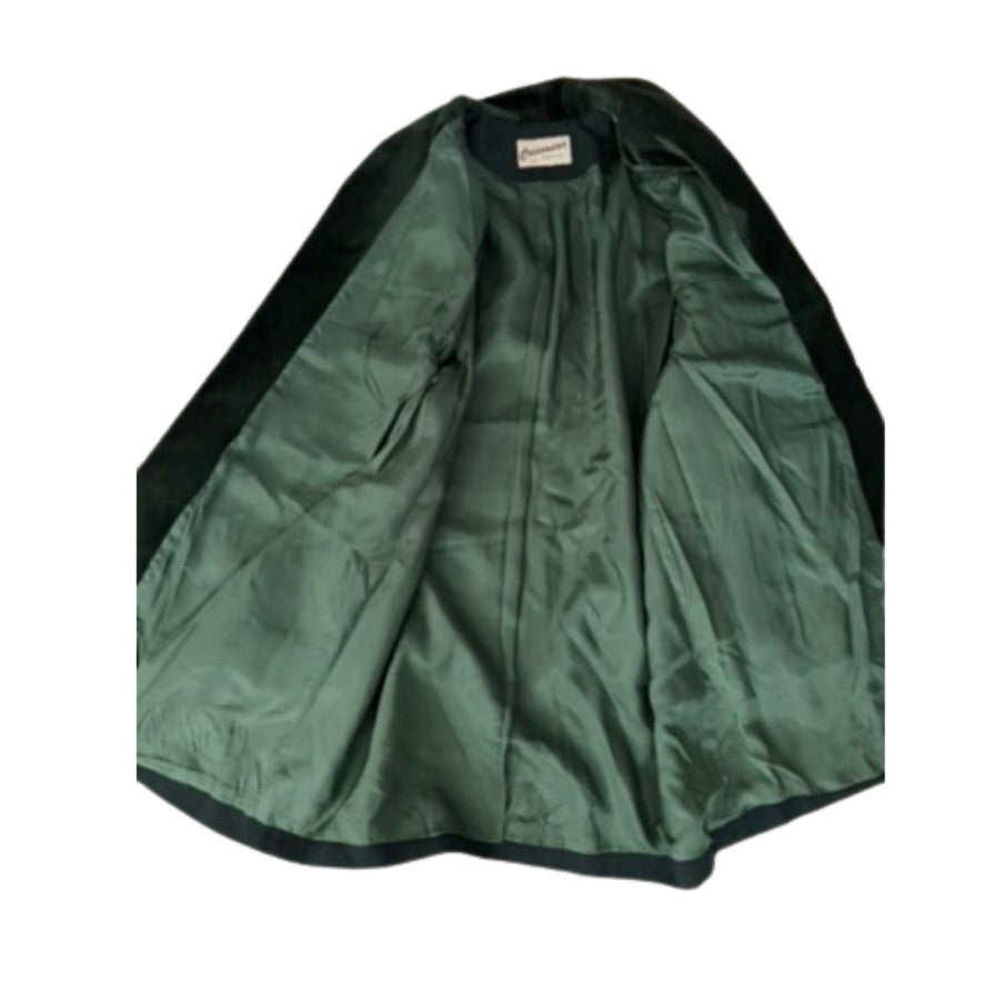 Green cape with black trim on a white background