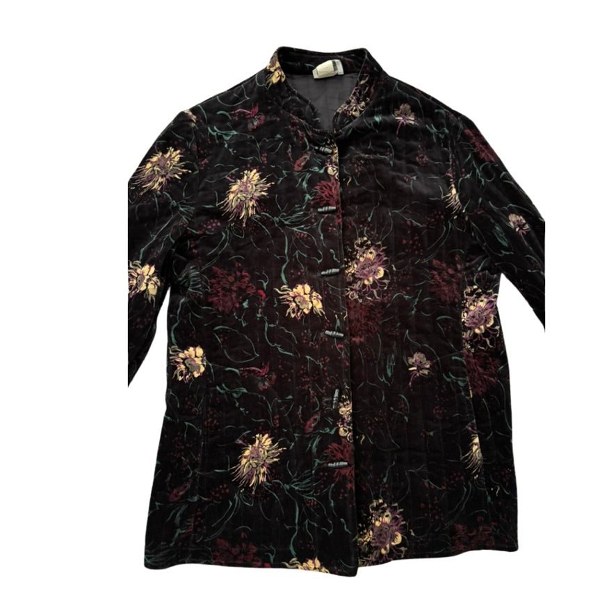 Floral patterned coat on a white background