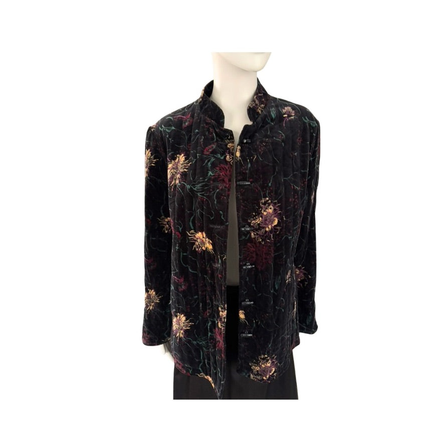 Black floral patterned jacket on a mannequin against a white background