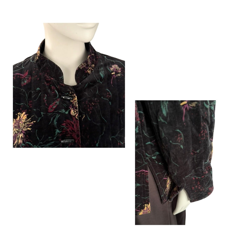 Mannequin wearing a dark floral patterned jacket with close-up details on a white background