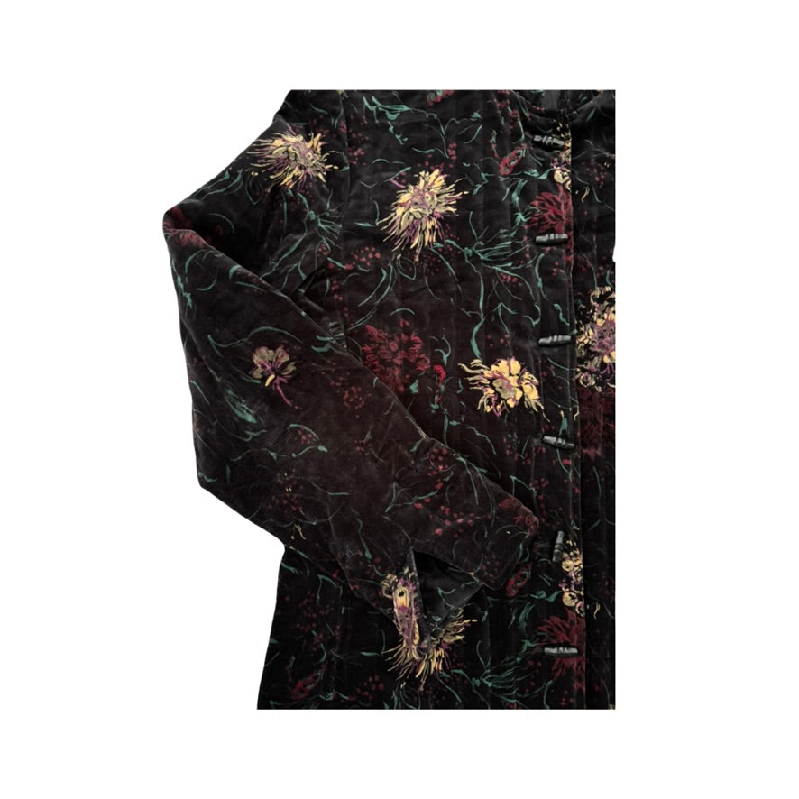 Dark floral patterned fabric on a white background