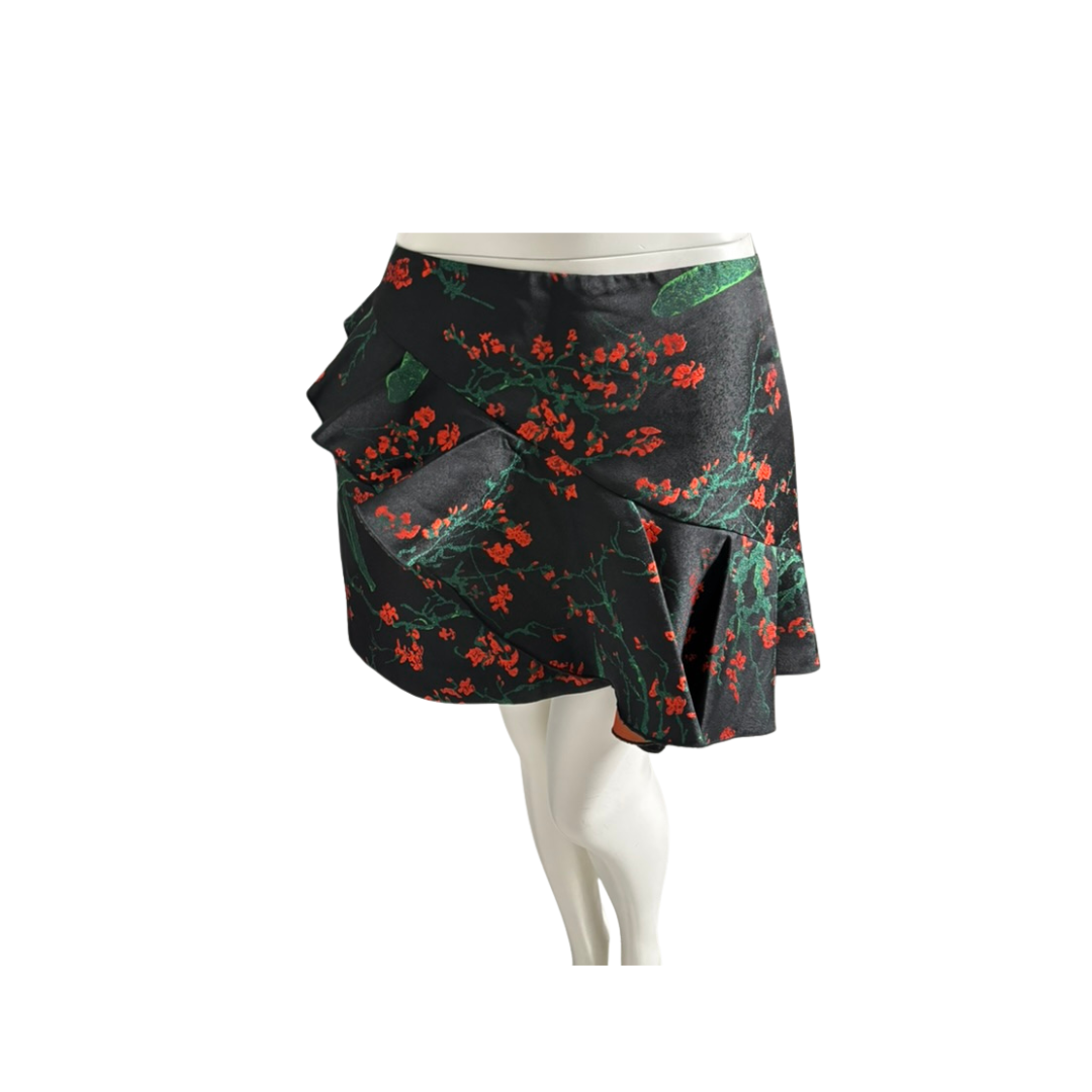 Floral patterned skirt on a mannequin against a white background