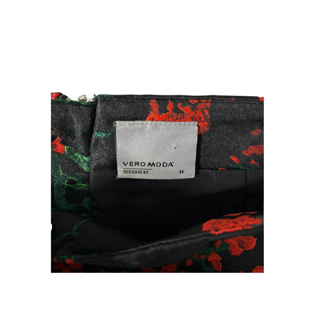 Vero Moda bag with floral pattern and visible brand label on a white background