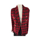 Red and black plaid jacket on a mannequin against a white background