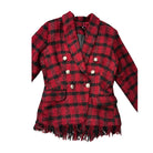 Red and black plaid jacket with frayed hem on a white background