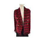 Red and black plaid jacket on a mannequin against a white background