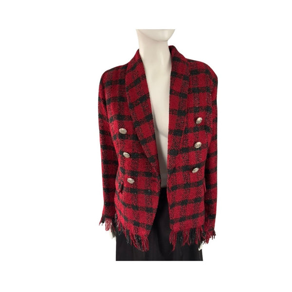 Red and black plaid jacket on a mannequin against a white background