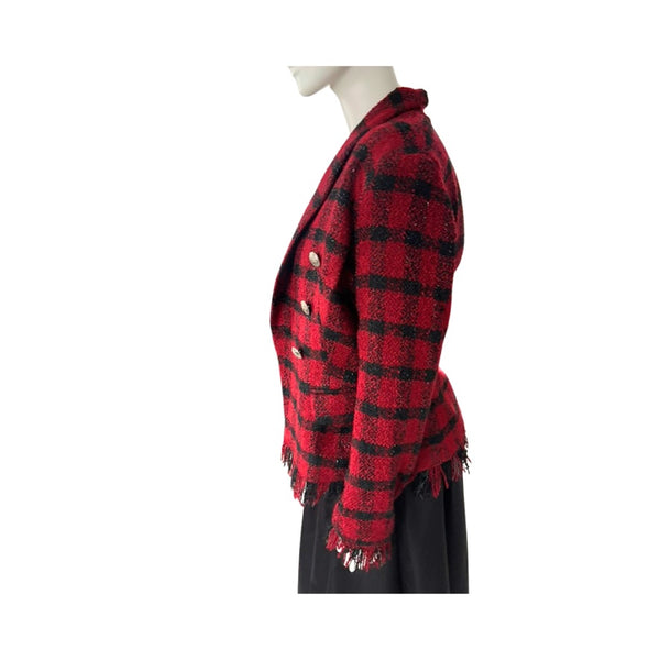 Red and black plaid jacket on a mannequin against a white background