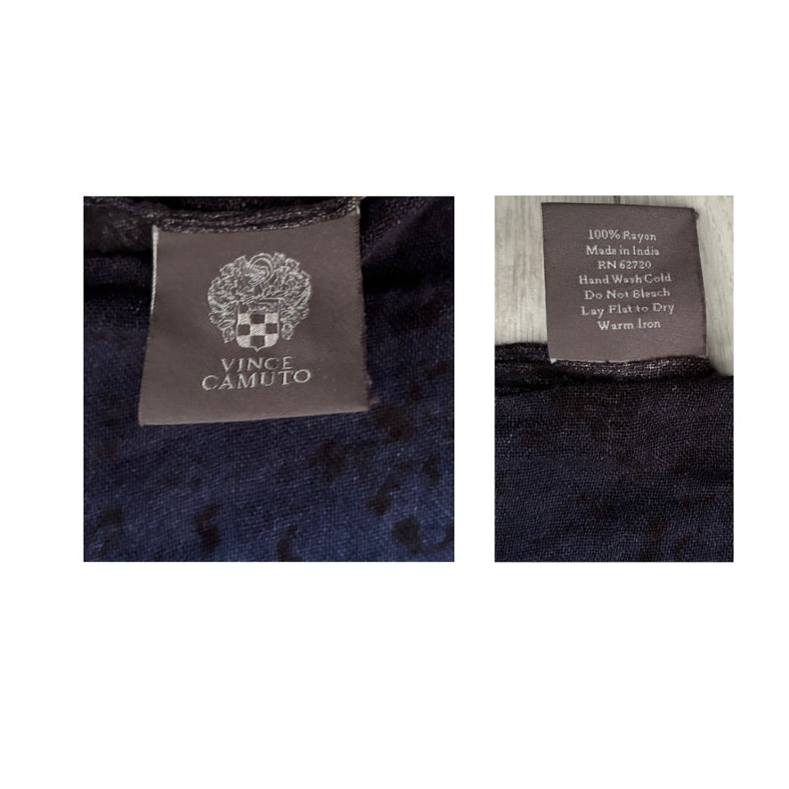 Vince Camuto label on a garment with care instructions.