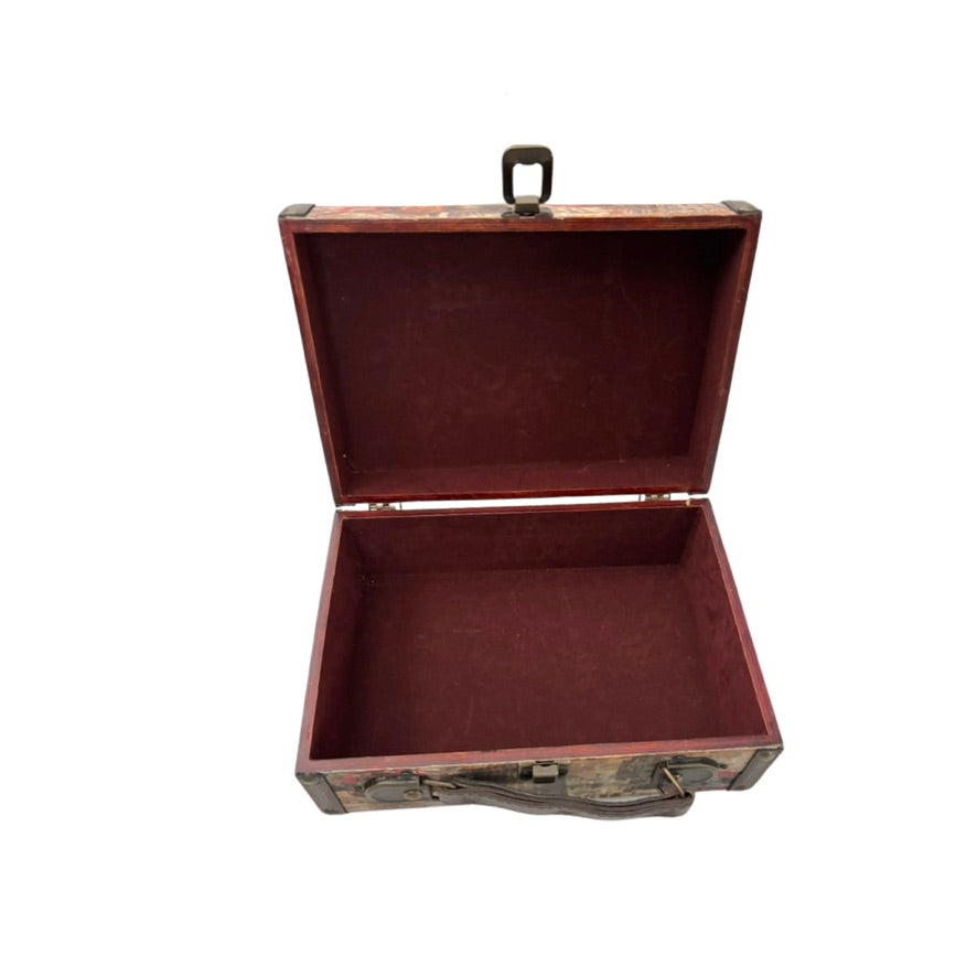 Open vintage suitcase on a white background