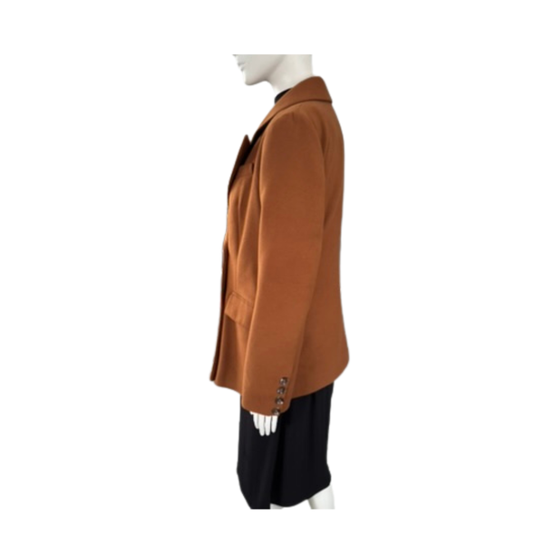 Brown jacket on a mannequin against a white background