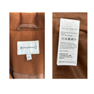 Brown fabric with 'Warehouse' label and care instructions on a white background