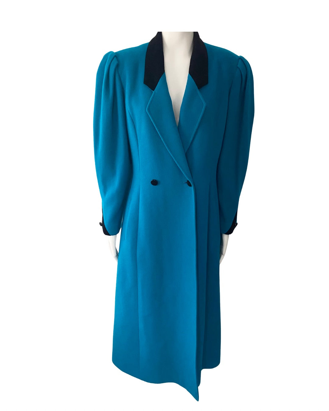 Blue coat with black collar on a mannequin against a white background
