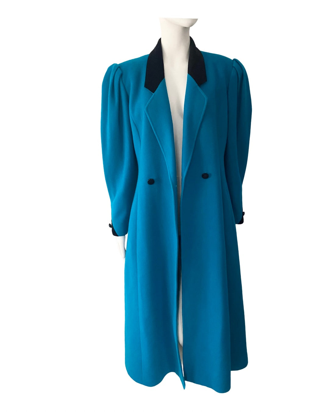 Blue coat with black collar on a mannequin against a white background