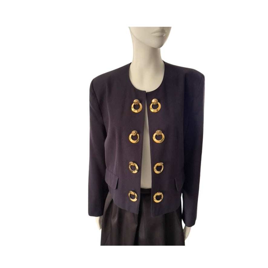 navy jacket with gold buttons on a mannequin against a white background