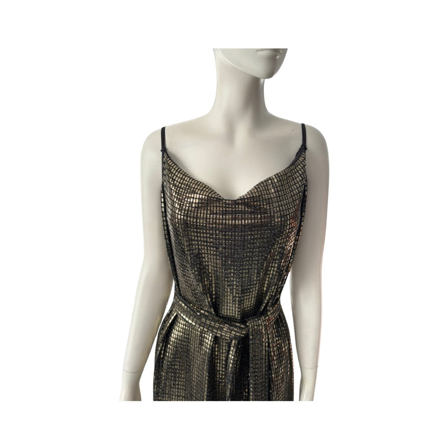 Mannequin wearing a black and gold patterned dress on a white background