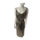 Metallic dress on a mannequin against a white background