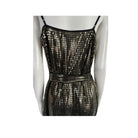 Mannequin wearing a metallic dress on a white background