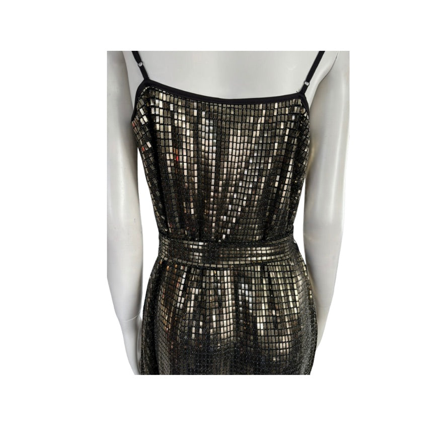 Mannequin wearing a metallic dress on a white background