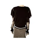 Black and grey outfit on a mannequin against a white background