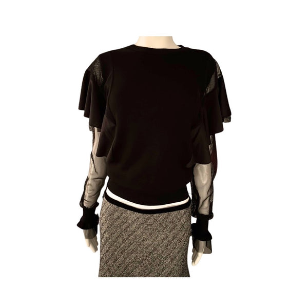 Black and grey outfit on a mannequin against a white background