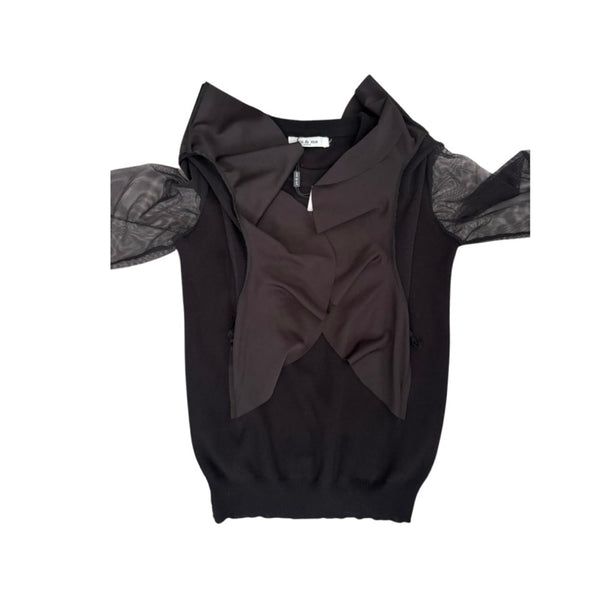 Black top with unique design on a white background