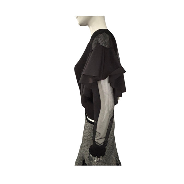 Mannequin wearing a black and gray outfit on a white background