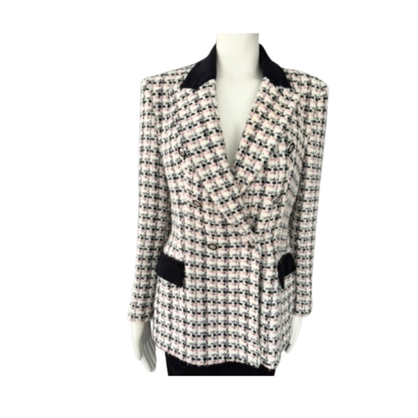 Houndstooth patterned blazer on a mannequin against a white background