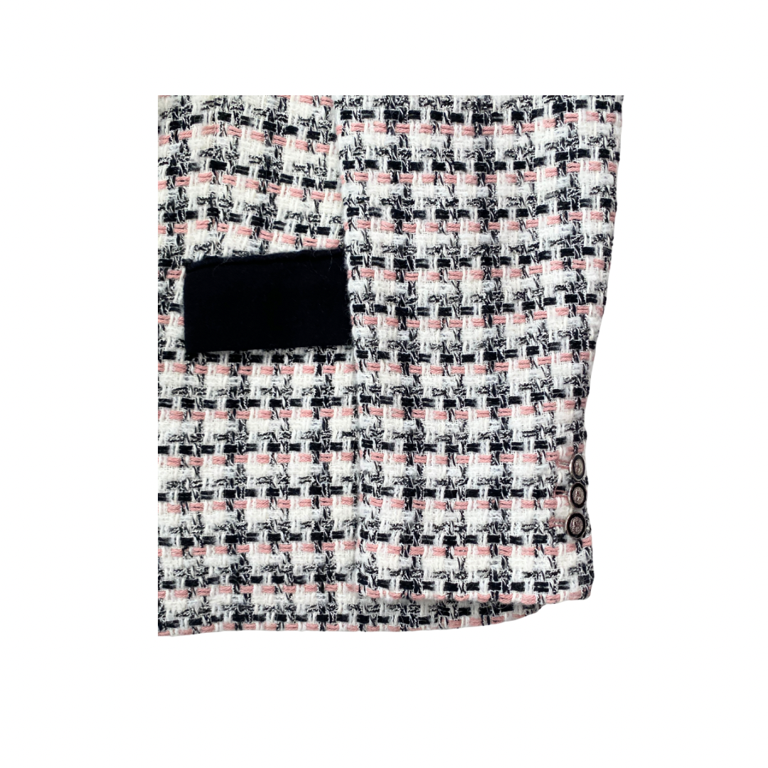Patterned fabric with a black pocket on a white background