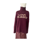 Burgundy sweater with 'LOVE YOURSELF' text on mannequin on a white background