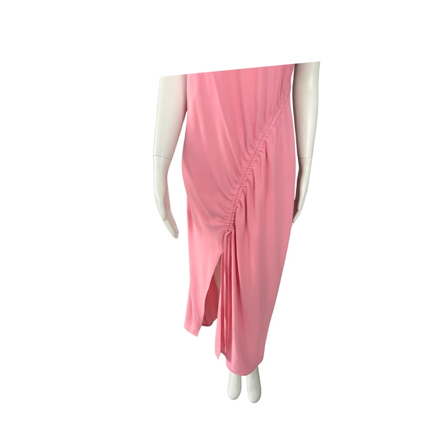 Mannequin wearing a pink dress on a white background