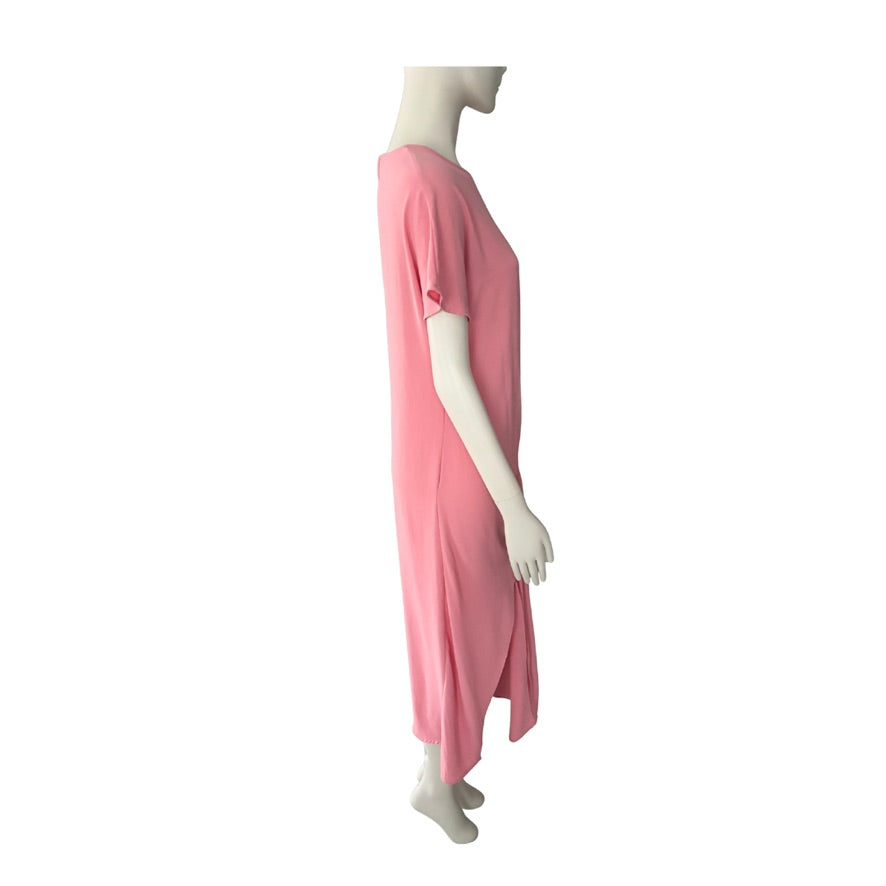 Mannequin wearing a pink dress on a white background