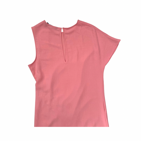 Pink sleeveless dress on a white background