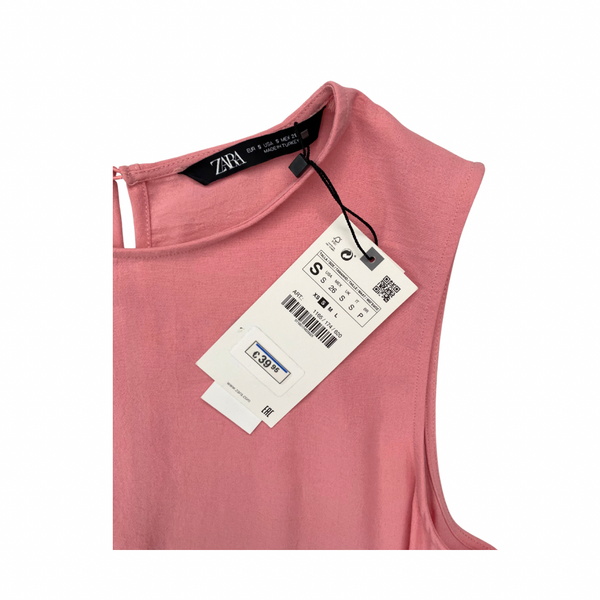 Pink sleeveless top with a Zara tag on a white background