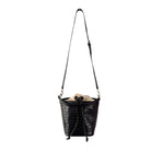 Black crocodile-patterned leather bucket bag with a strap on a white background