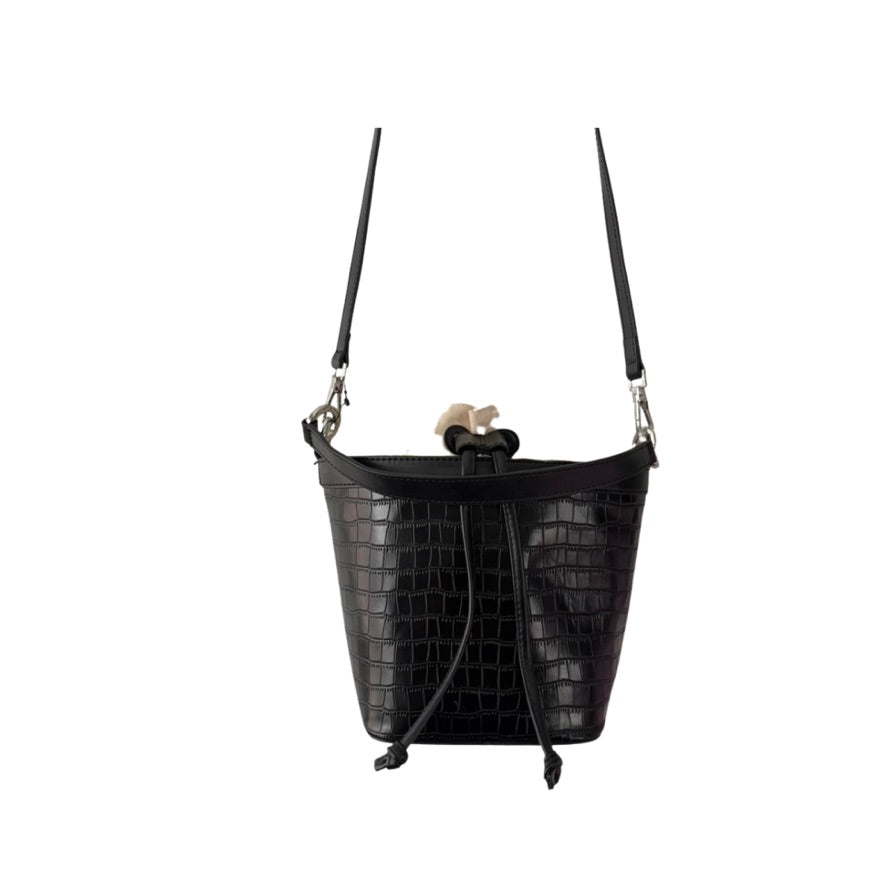 Black crocodile-patterned handbag with a strap on a white background