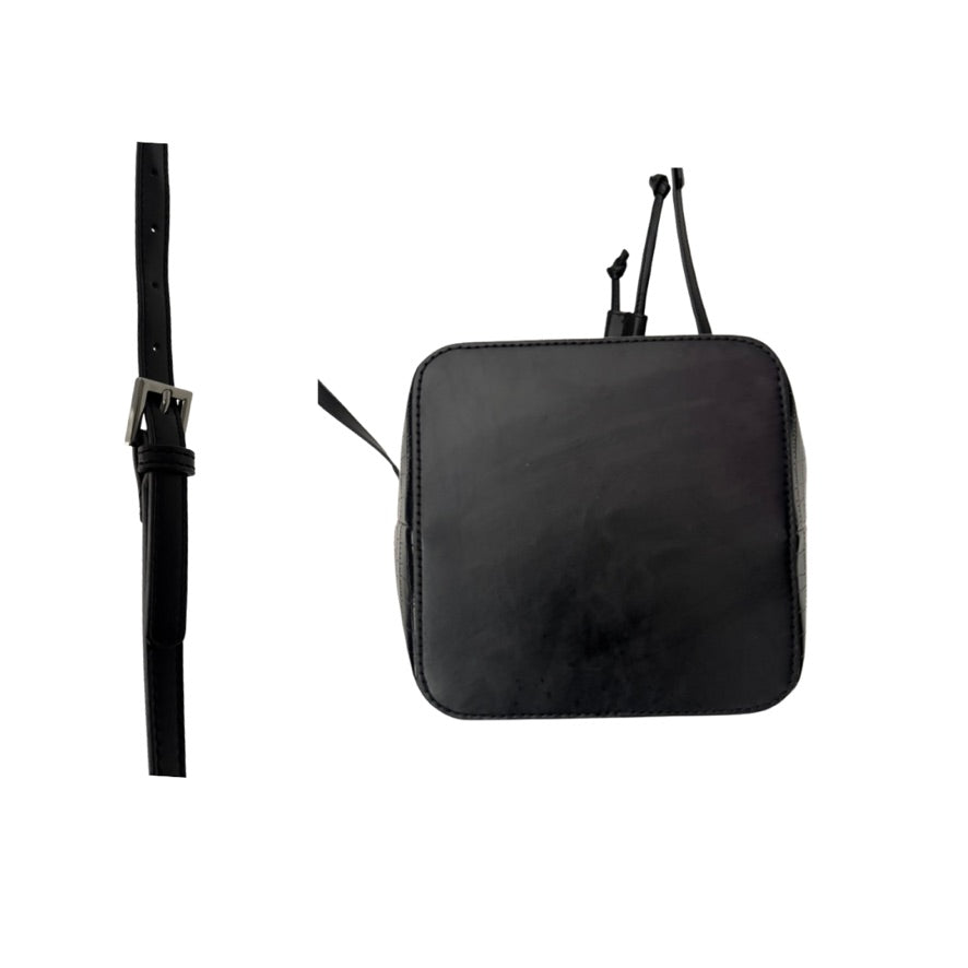 Black leather bag with a strap on a white background