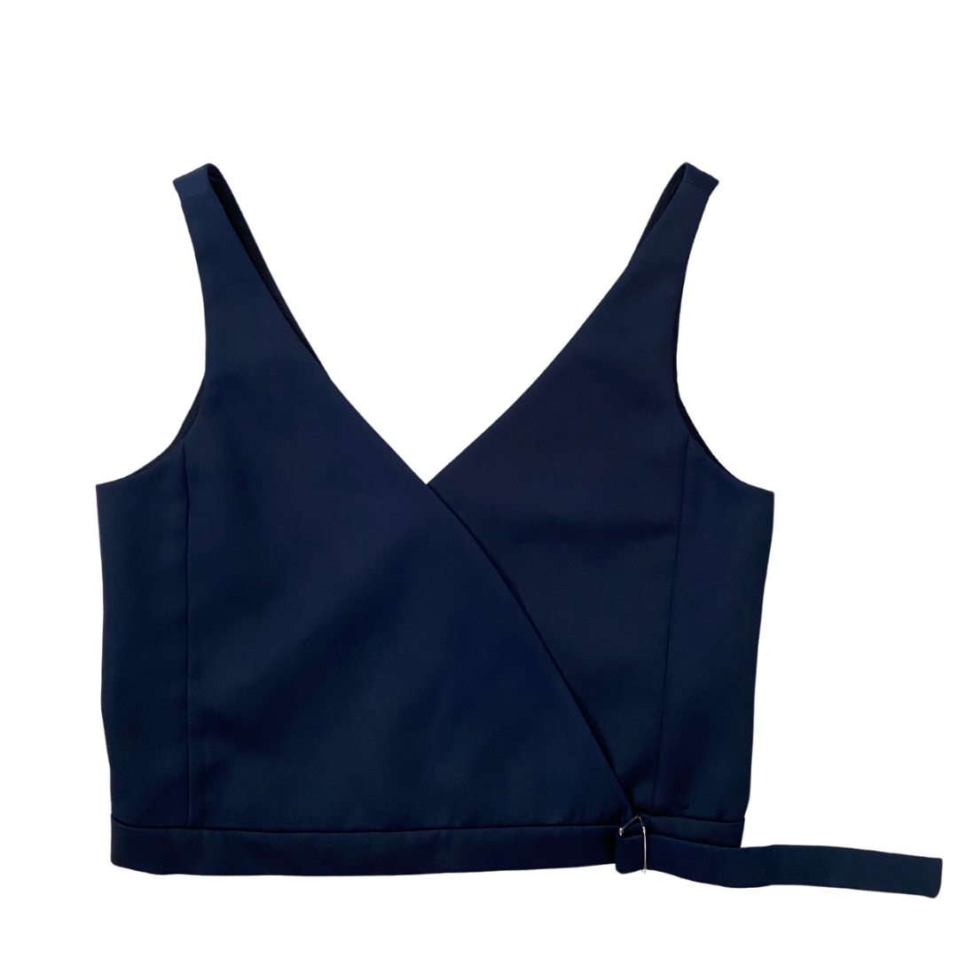 A navy-colored, sleeveless, crop-style vest top with a deep V-neckline and an adjustable side tie detail.