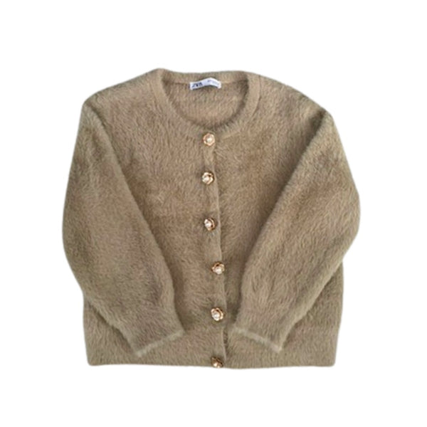 Beige cardigan with buttons on a white background