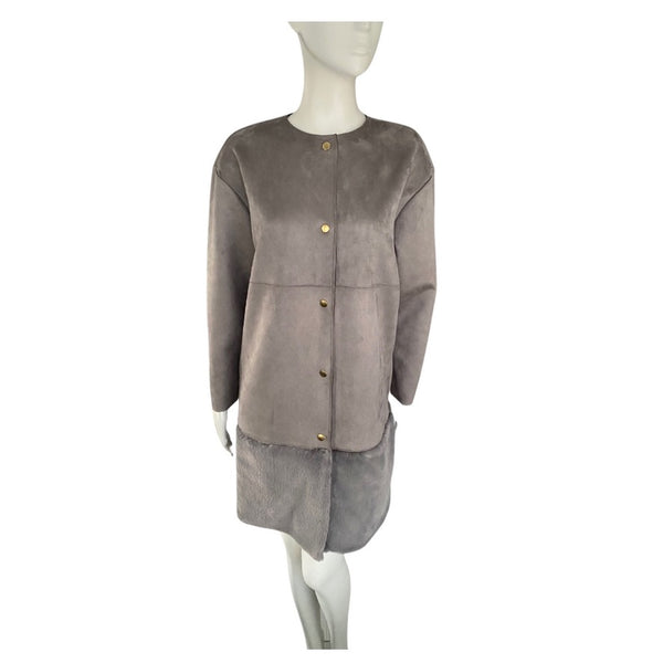 Grey suede dress on a mannequin against a white background