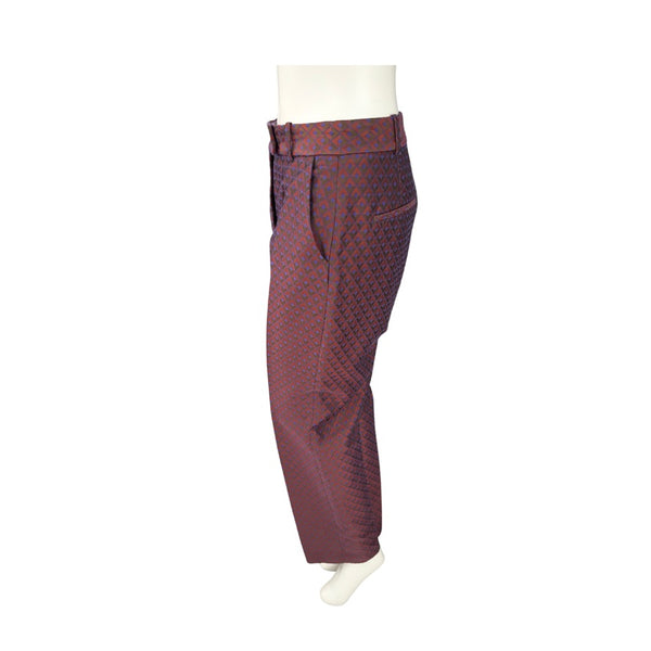Maroon patterned pants on a mannequin against a white background